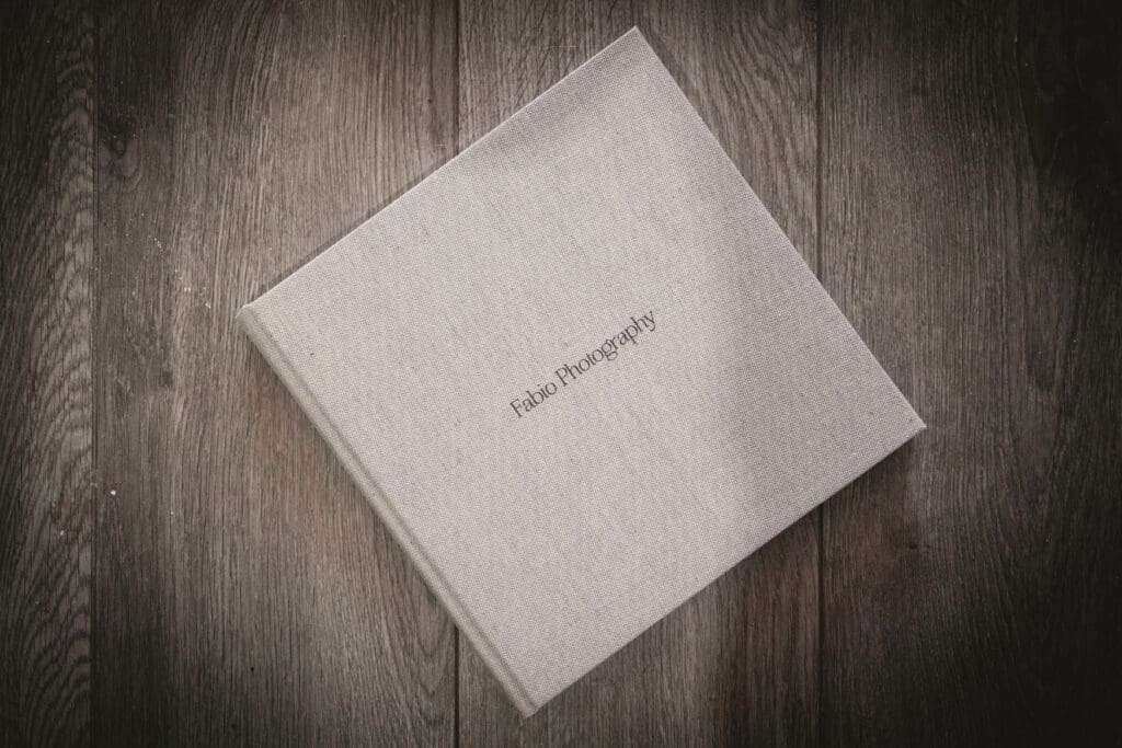 A closed linen wedding album from Fabio Photography
