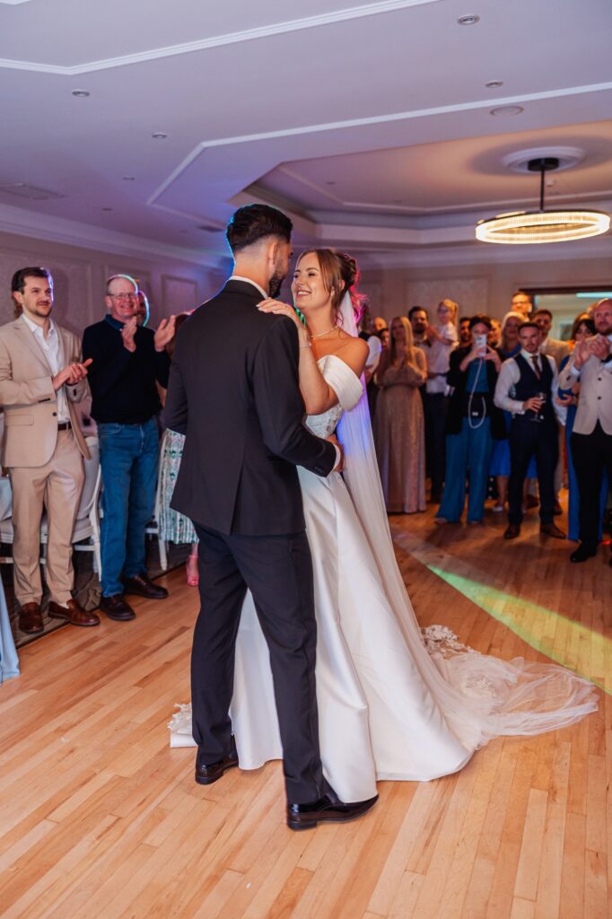 The first dance at Wentbridge House Hotel, the bride's train sweeping across the floor.