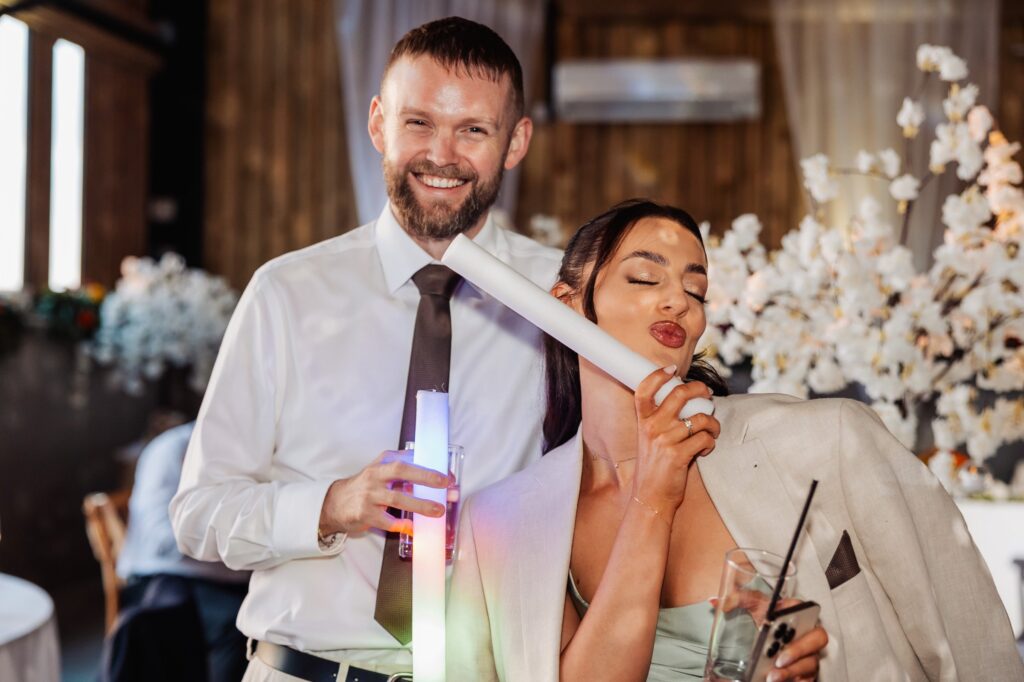 Guests celebrating with sparklers during the evening reception at Sedgewell Barn