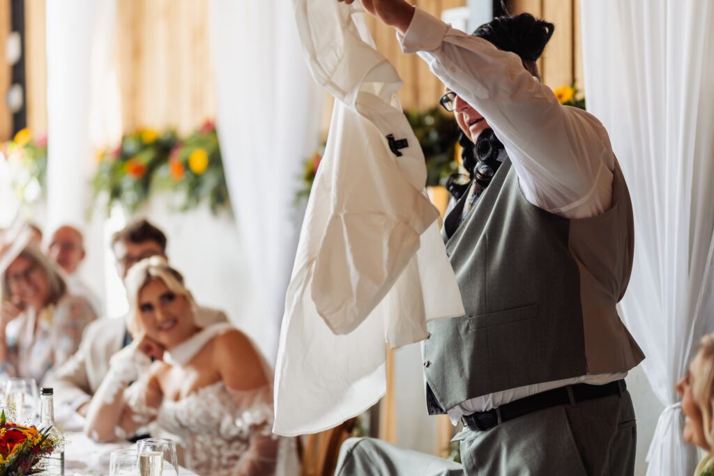 Guest waving a napkin above the tables during the speeches