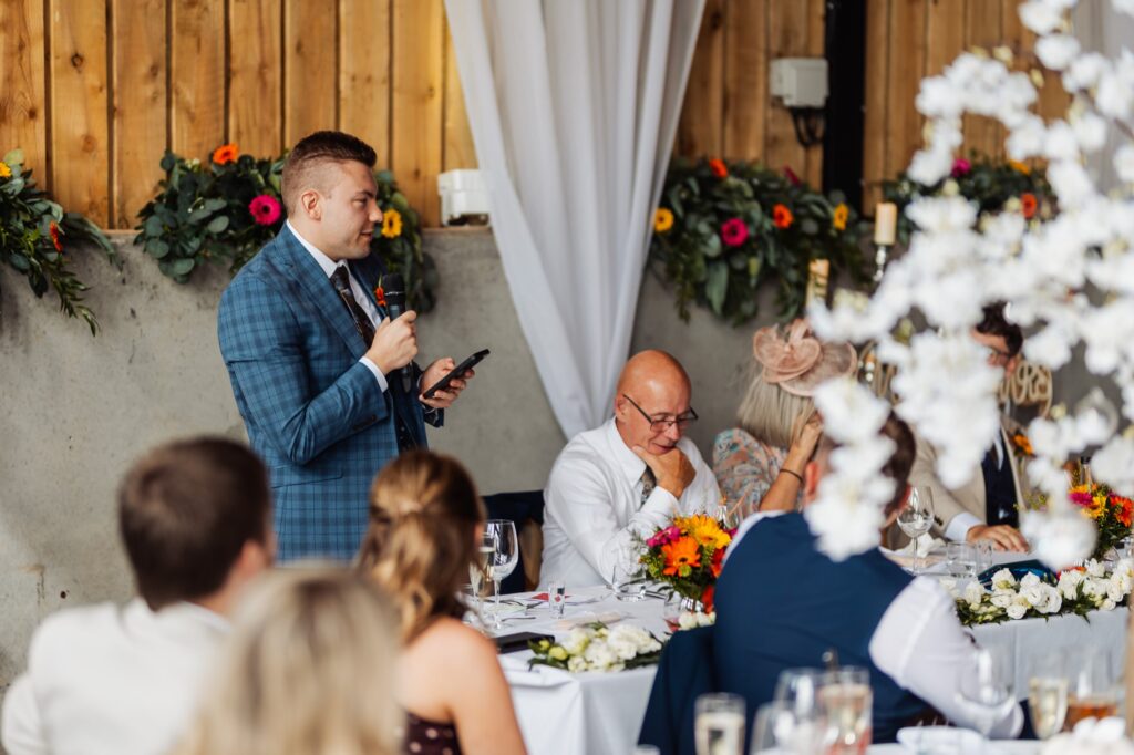 Best man delivering a speech during the reception at Sedgewell Barn