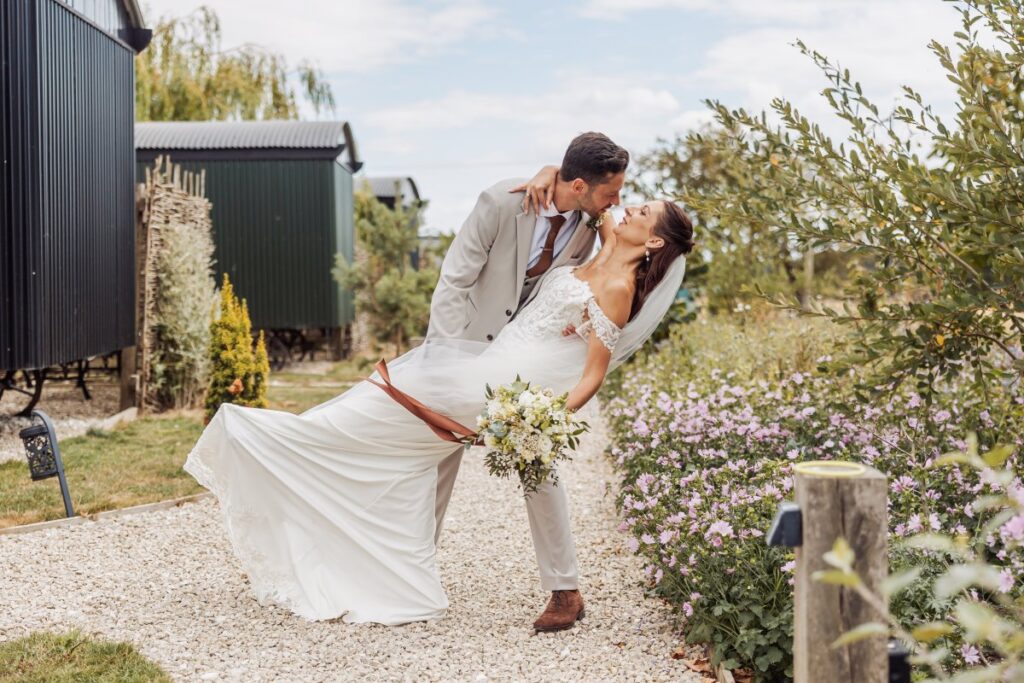 An unposed moment on the gravel path between the shepherd's huts at Clayfield Farm.