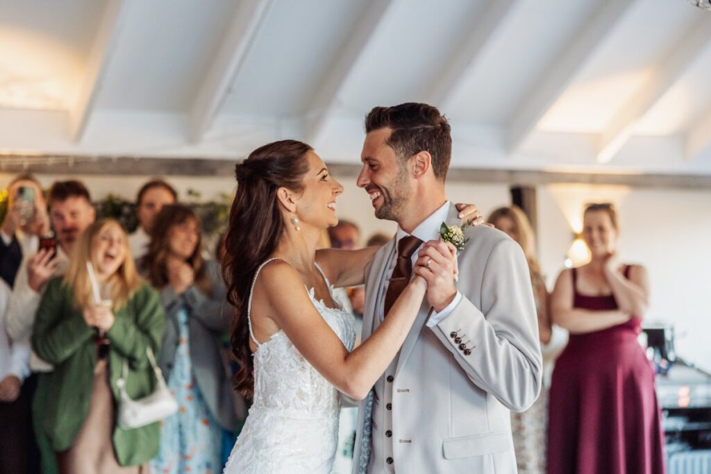 The first dance under the white pitched ceiling of the oak-framed room at Clayfield Farm.