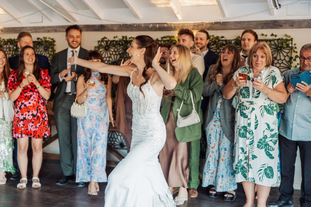 The bride on the dance floor as the evening party gets going at Clayfield Farm.